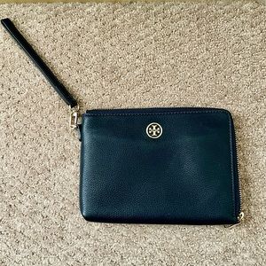 Tory Burch wristlet wallet. Color is Nay blue. Dimensions approx 8”W x 6”H x 1”D